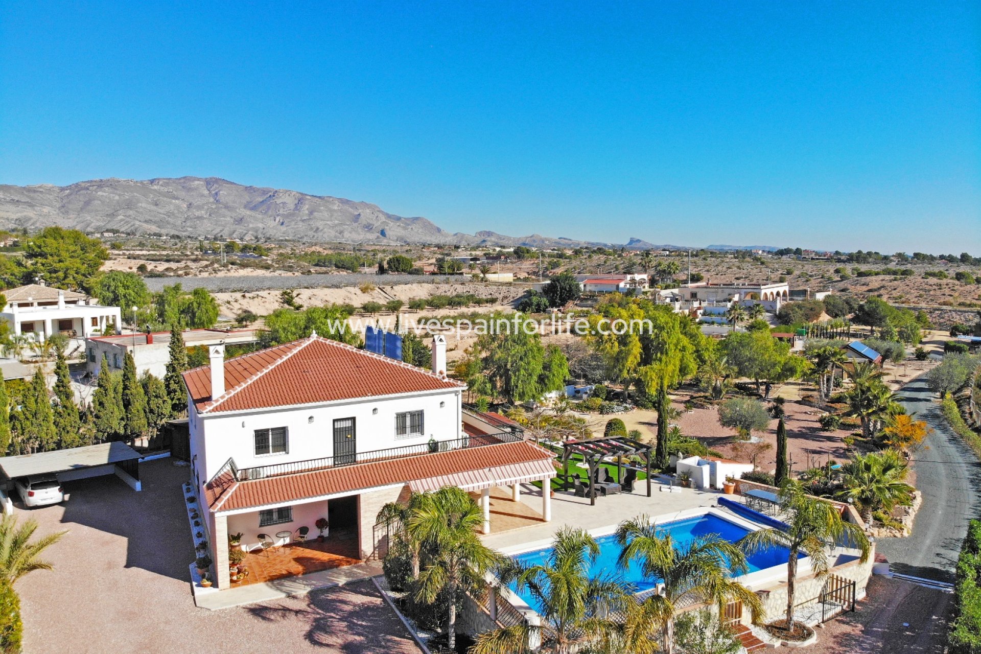 Aerial view of the property and surroundings